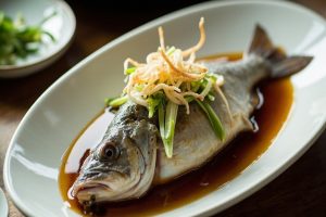 barramundi steamed Cantonese whole fish with ginger and scallion