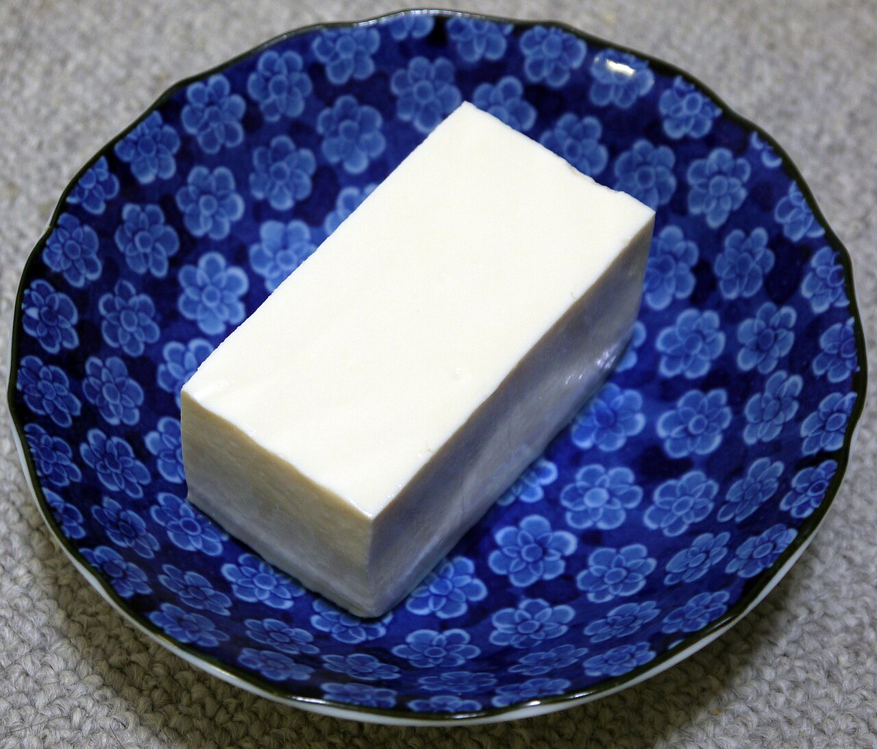 Silken tofu prepared for Cantonese steamed tofu with soy sauce