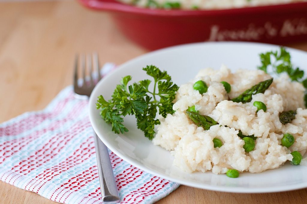 Finished rice casserole serving context for reviewing rice crust, sauce, and topping texture