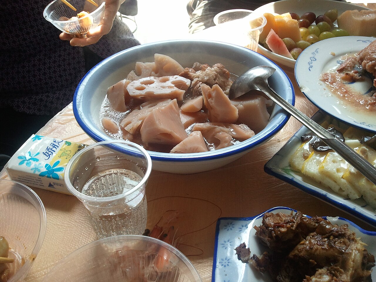 cantonese lotus root soup with pork ribs opening scene showing lotus root soup
