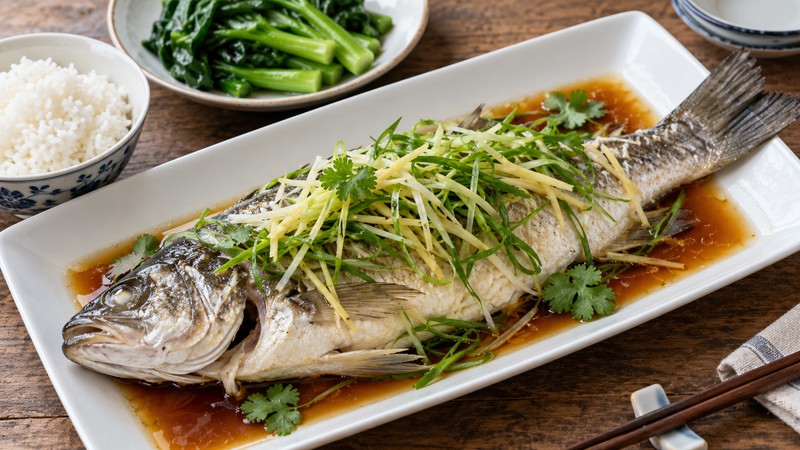 Cooked whole fish with ginger, scallion and soy sauce