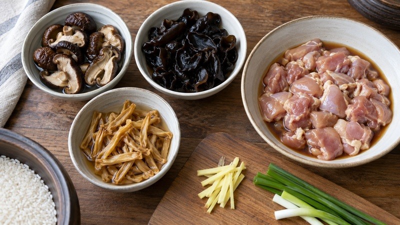 Rehydrated mushrooms and lily flowers beside marinated chicken