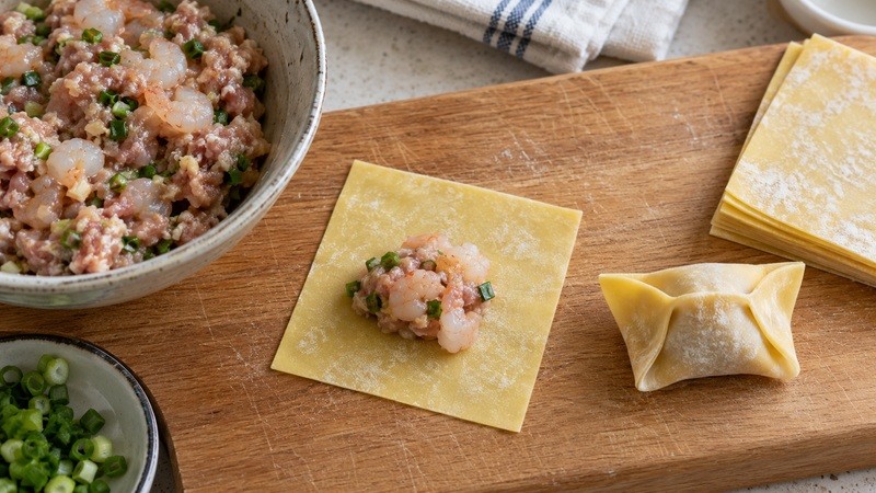Small filling portion and a sealed thin wonton wrapper